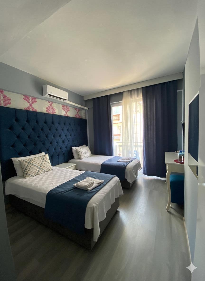 akman city hotel kuşadası standard rooms — 2