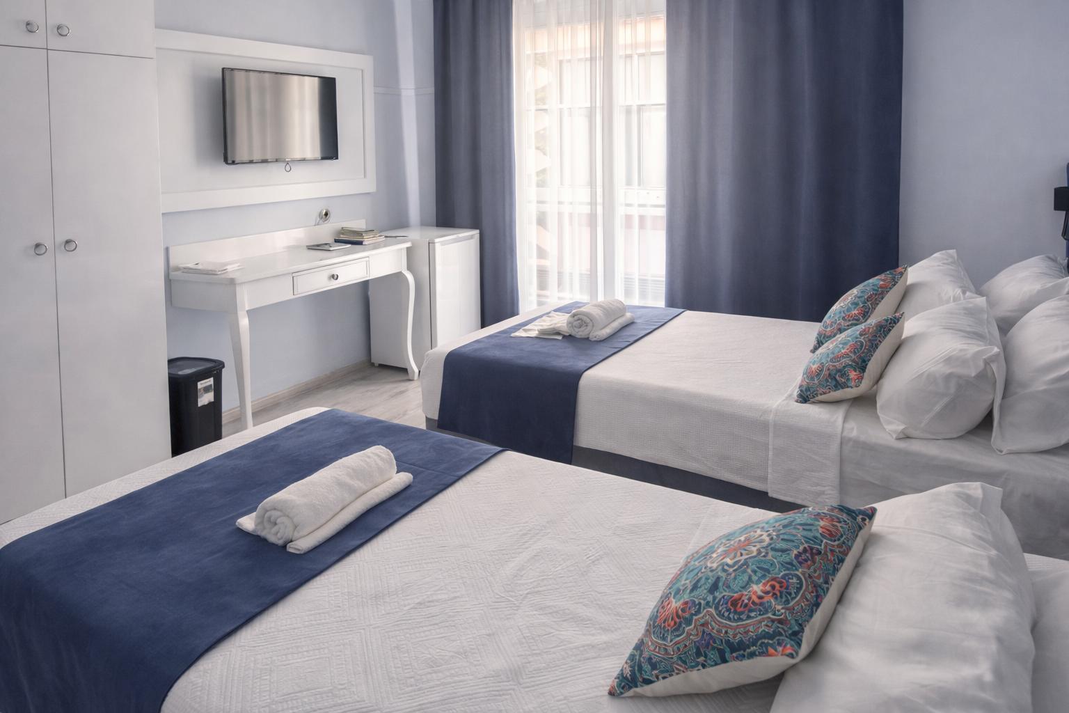 akman city hotel kuşadası family rooms — 12